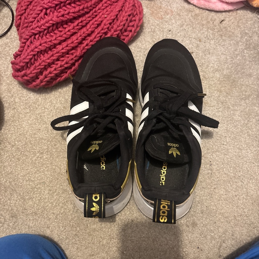 Adidas Black and Gold Sneakers